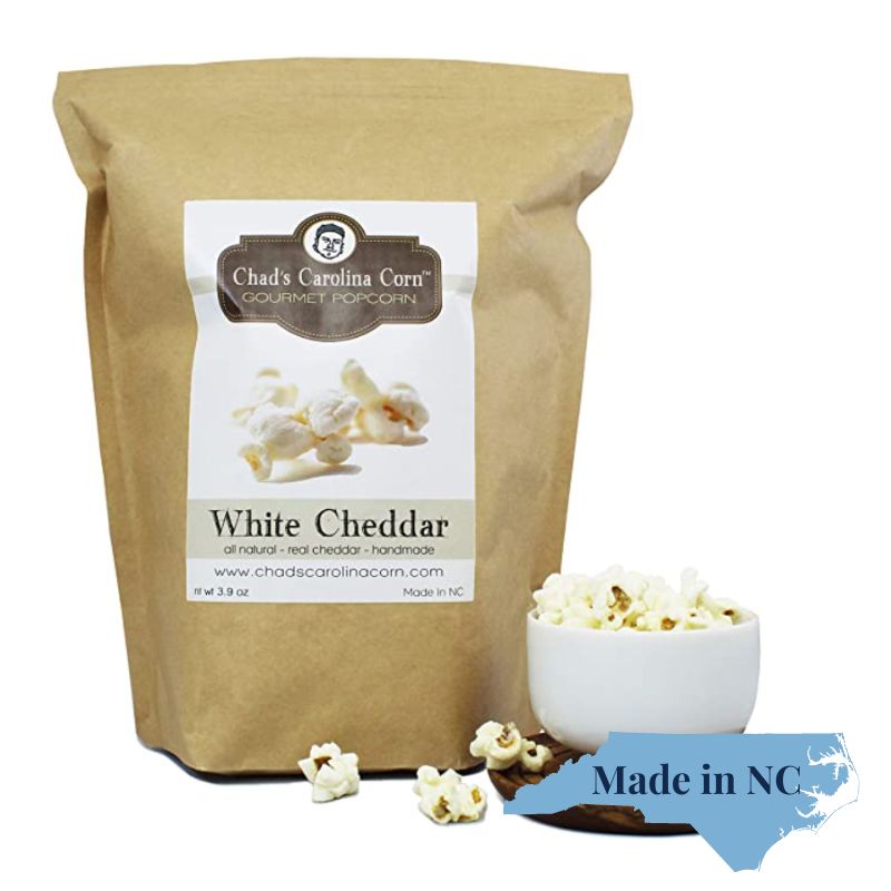 Chad’s Carolina White Cheddar Popcorn, creamy and savory gourmet popcorn, included in the Carolina Crunch Gift Basket which is full of locally made products from North Carolina