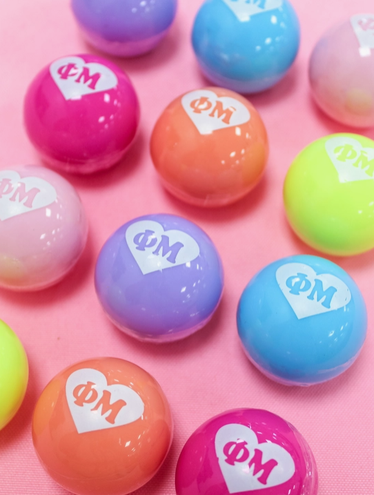 Phi Mu lip balms in a variety of colors.