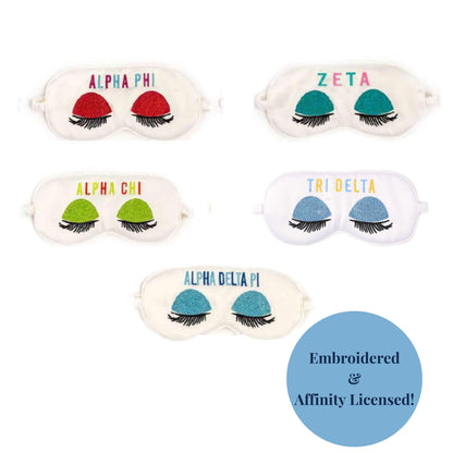 Satin embroidered eye mask from the Carolina Sorority Basket, ideal for restful sleep.