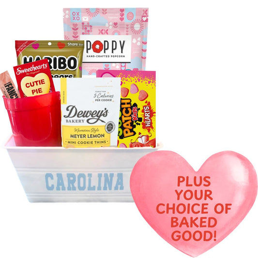 UNC Valentine’s Day Gift Basket filled with sweet treats including Haribo Gummy Bears, Poppy Cotton Candy Popcorn, and more, pl,us customer's choice of fresh baked Valentine's treat all packaged in a Carolina plastic bucket