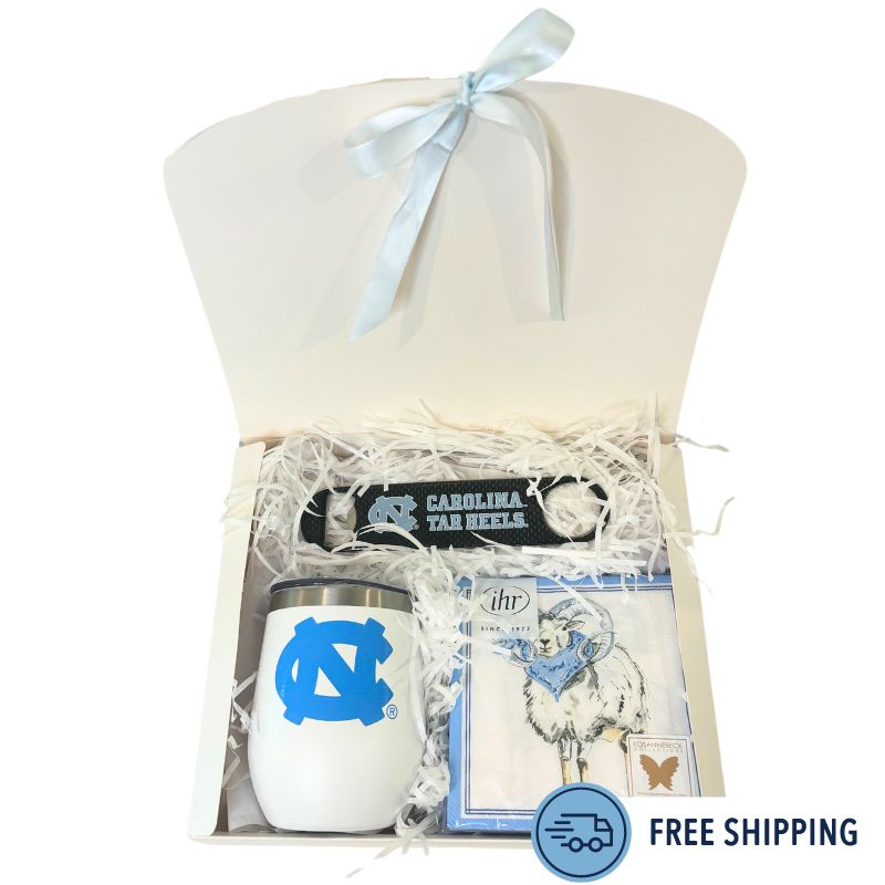 Carolina Celebration Gift Kit featuring a UNC  Tumbler with Lid, UNC Ram Beverage Napkins, and an officially licensed UNC Bottle Opener, all neatly packaged