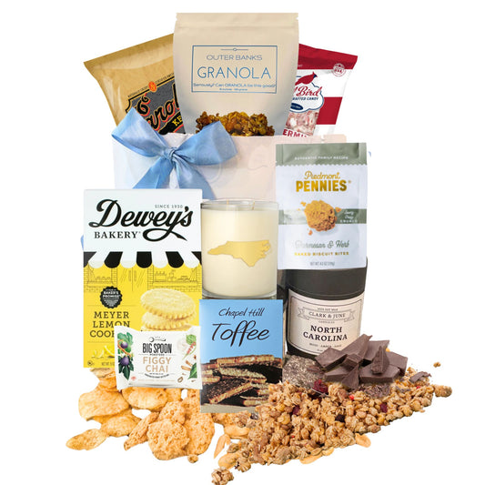 local north carolina food products displayed with gift bag and blue satin ribbon