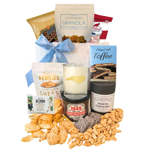 local north carolina food products displayed with gift bag and blue satin ribbon