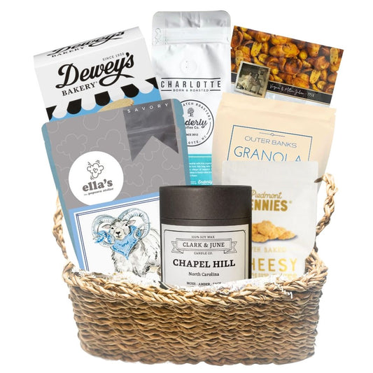 Carolina Blue Deluxe Gift Basket filled with UNC-branded items and premium North Carolina-made treats, perfect for celebrating Tar Heel pride and local flavors.