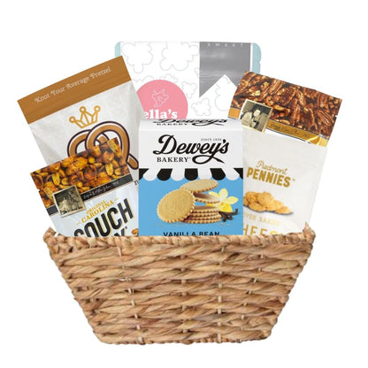 Large woven basket full of locally made NC gourmet snacks including savory and sweet options for Tar Heels 