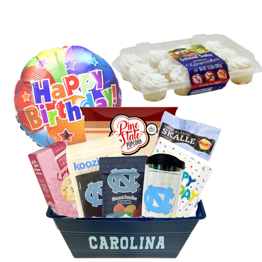 Nut-Free Tar Heel Birthday Surprise basket featuring 12 mini cupcakes, Cybele’s Confetti Cookies, UNC-themed treats, and festive birthday accessories